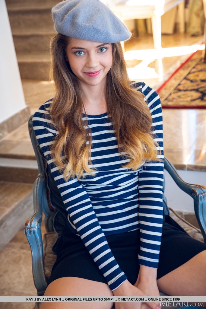 Playful Blue-Eyed Tease photo 1